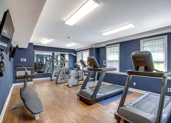 a fitness center with treadmills at Park Crest Apartments, District of Columbia 20007