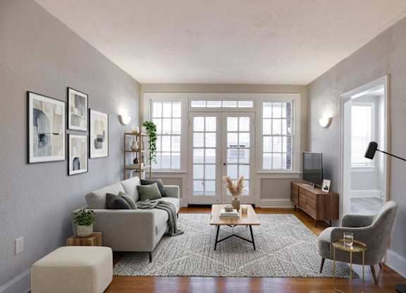 Living room with sunroom at The Paramount Apartments in the Petworth neighborhood in Washington, DC 20011