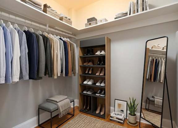 Walk-in closet (virtually staged) for studio apartment at 4115 Wisconsin Avenue Apartments in Washington, DC 20016