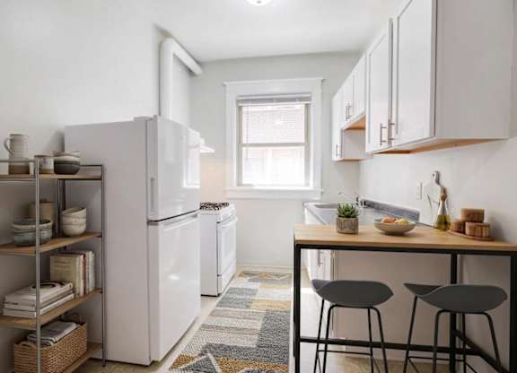 Kitchen (virtually staged) at 4115 Wisconsin Avenue Apartments in the Tenleytown neighborhood in Washington, DC 20016