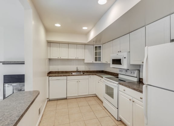 Townhome kitchen with classic finishes  at Lenox Park, Silver Spring, 20910