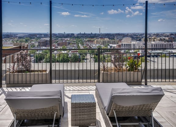 Rooftop deck with lounge chairs at Highview and Castle Manor, Washington, 20009