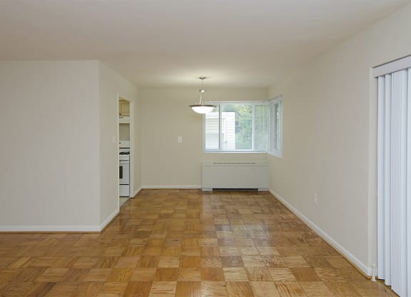 One-bedroom living and dining at Legation House in Washington, DC 20015