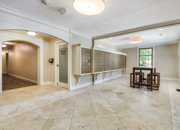 Lobby with post boxes and seating area at Mason Hall in Alexandria, VA 22314