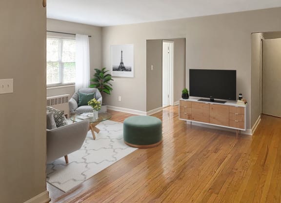 Apartment living area (virtually staged) at Mason Hall in Alexandria, VA 22314