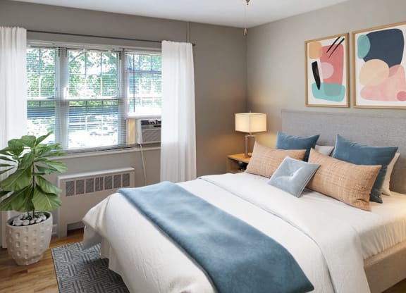 Apartment bedroom (virtually staged) at Mason Hall in Alexandria, VA 22314