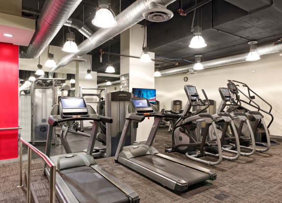 Fitness center with cardio machines at Park Place at Petworth, Washington, 20011