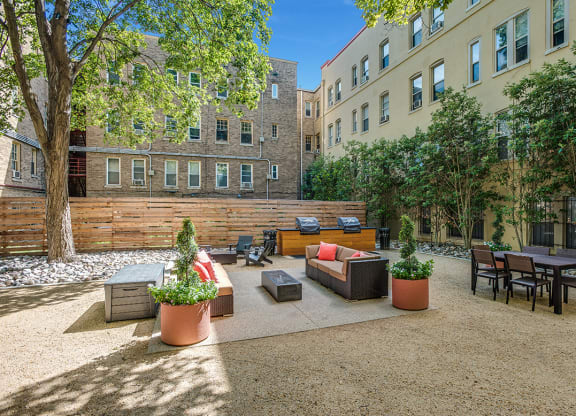 Courtyard with seating area and grills at President Madison, Washington, DC, 20009