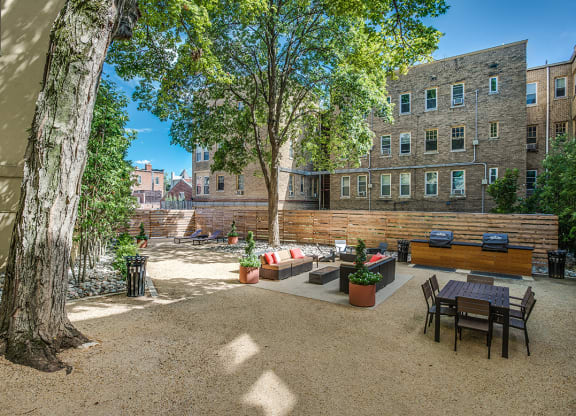 Courtyard with seating area and grills at President Madison, Washington, DC, 20009