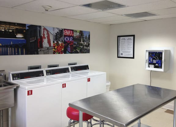 Laundry room with seating area at President Madison, Washington, 20009