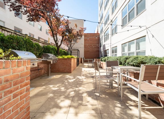 Courtyard with grills at West End Residences, Washington