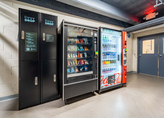 a row of vending machines in front of a door