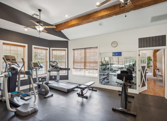 the gym with treadmills and weights at 1861 muleshoe road