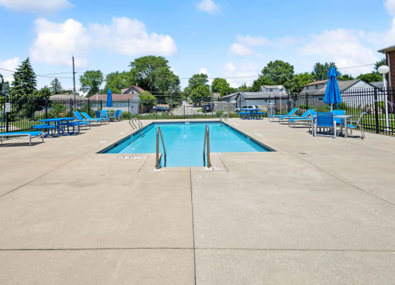 the pool is clean and ready for guests to use at the crossings at northwest apartments