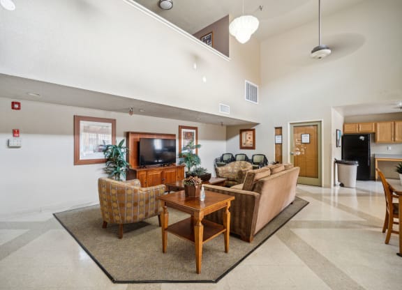 the living room of a house with a couch and a table