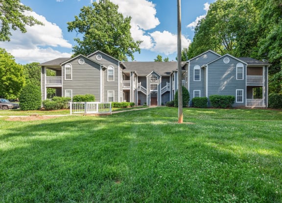a house with a yard in front of it