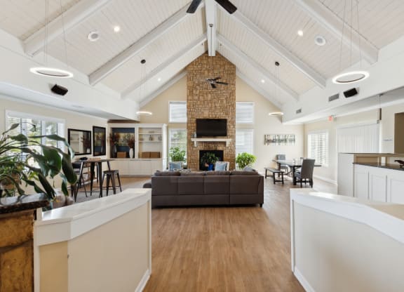 a living room with a couch and a fireplace