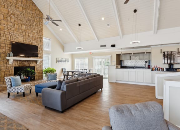 a living room with a fireplace and a couch