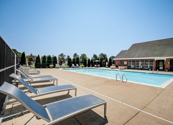 our resort style swimming pool is in front of our building with lounge chairs