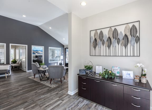 an open living room and dining room with a table and chairs