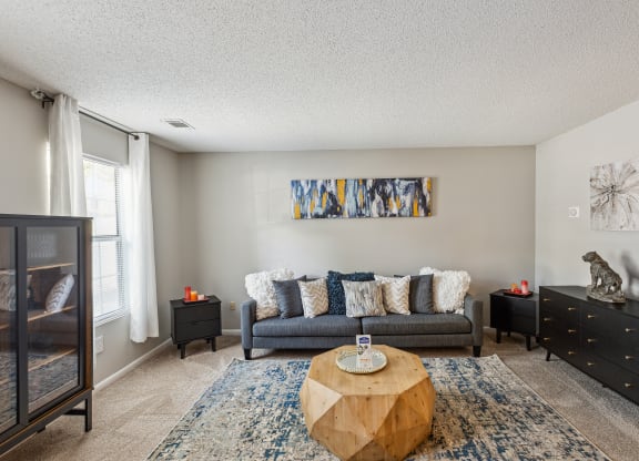 a living room with a couch and a coffee table