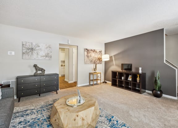 a living room with a couch and a coffee table