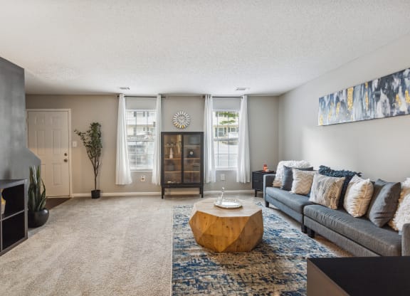 a living room with a couch and a coffee table