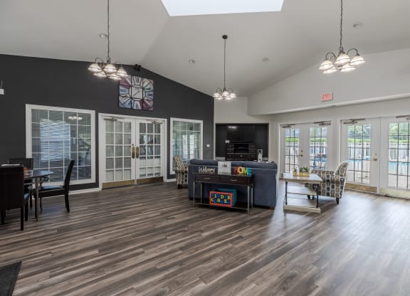 A room with wooden floors and a skylight.