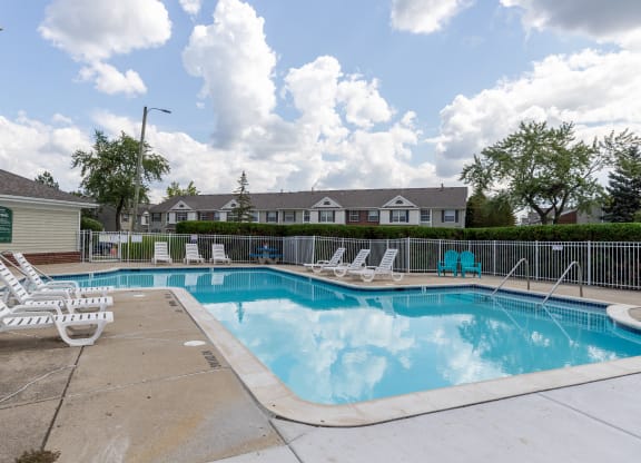 our apartments have a resort style pool with chaise lounge chairs