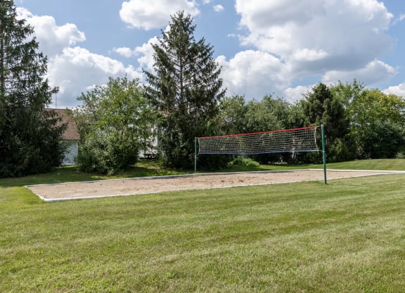 a soccer field with a net in the middle of a field