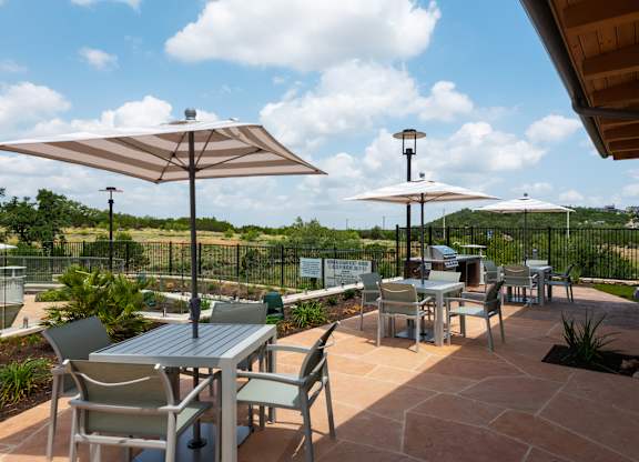 Outdoor Grilling Area and Tables at The Artesian at Bee Cave