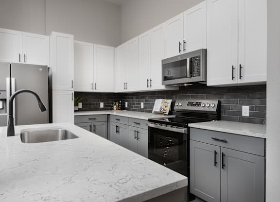 Bright And Spacious Kitchen With White Finishes