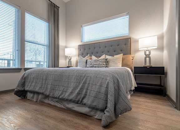 Large Bedroom With Wood Floors
