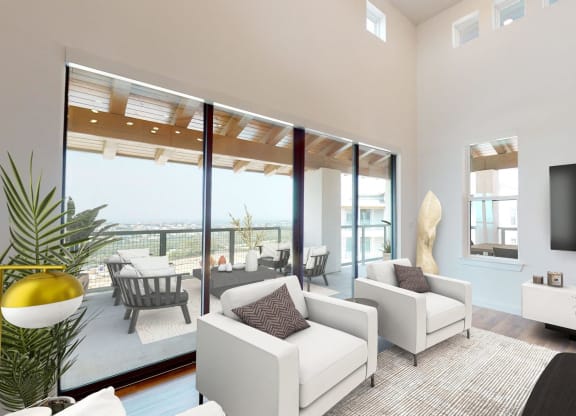 a living room with white furniture and a large television