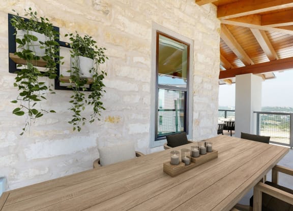 a dining room with a wooden table and a large window