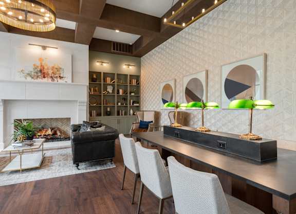 a living room filled with furniture and a fire place