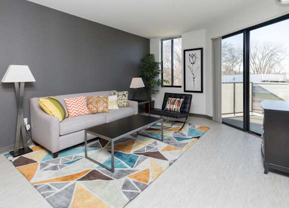 Spacious living room with neutral walls and ample natural light.