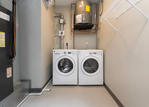 laundry room with storage space