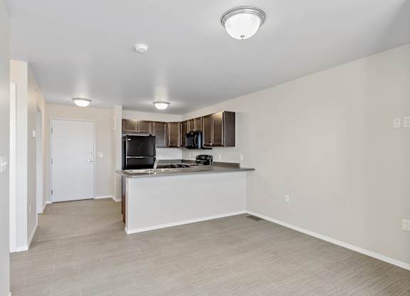 Kitchen with black appliances