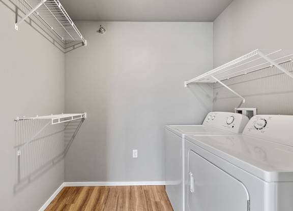 walk in closet with laundry