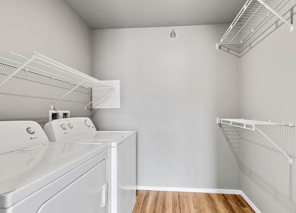 walk in closet with laundry