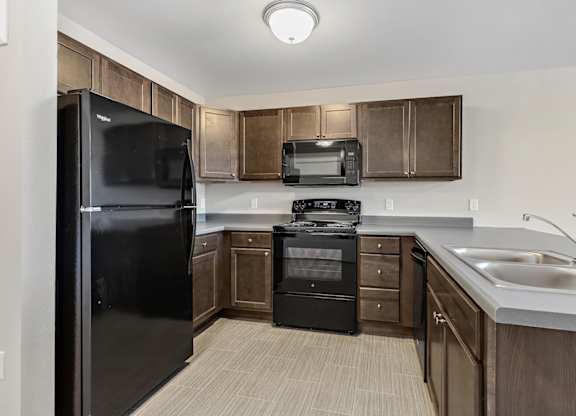 Kitchen with black appliances