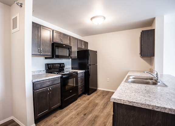 kitchen with black appliances