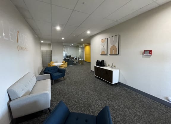 a large room with couches and chairs