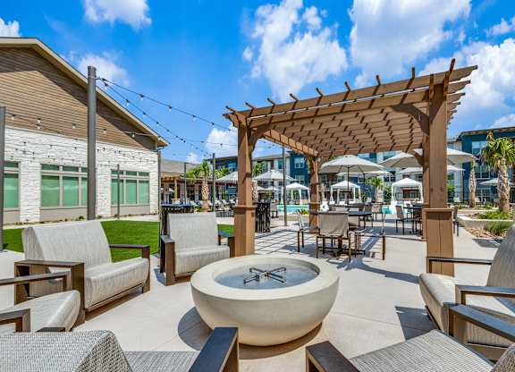 Courtyard With Ample Sitting and a pergola at Park Hill, Dallas, 75211