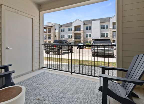 Balcony with Chair at McCarty Commons, San Marcos, TX