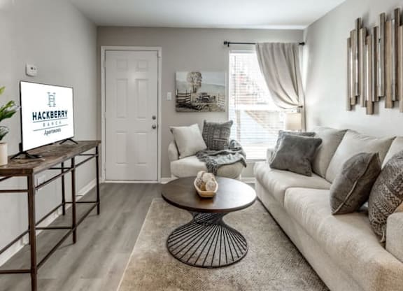Contemporary Living Room at Hackberry Ranch Apartments, Clute, TX