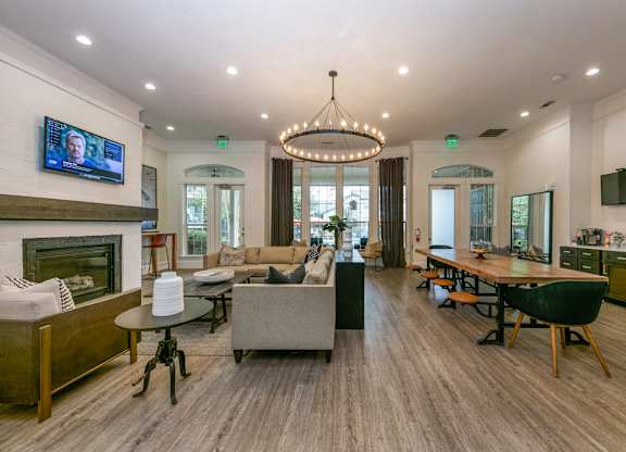 the reserve at bucklin hill clubhouse with fireplace and tv  at Sunrise Canyon, Universal City, TX