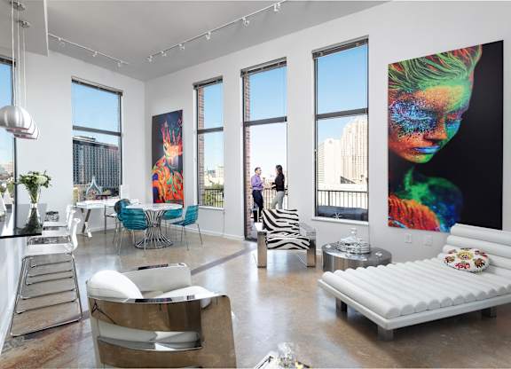 Bright loft with colorful artwork and contemporary furnishings at THE'68 Apartments, San Antonio, 78205