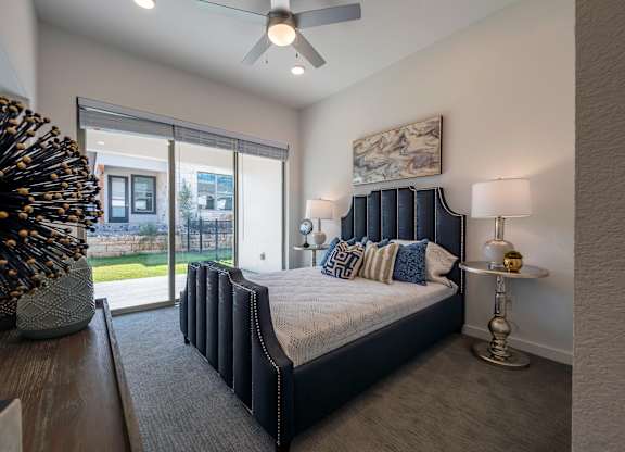 Bedroom With Ceiling Fan at Villas of Mason Hills, Leander, TX 78641